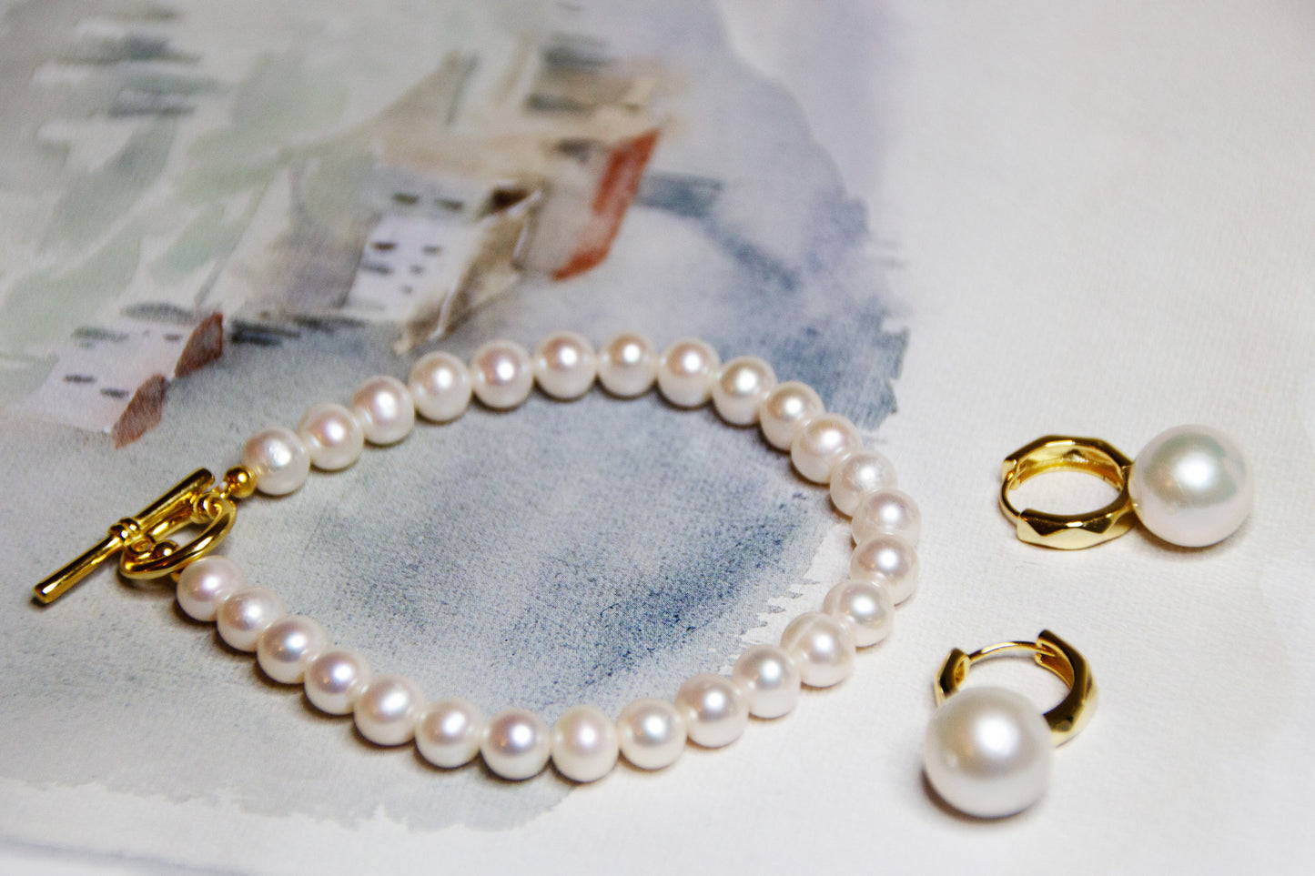 lady perfect silver örhängen och silver armband set 